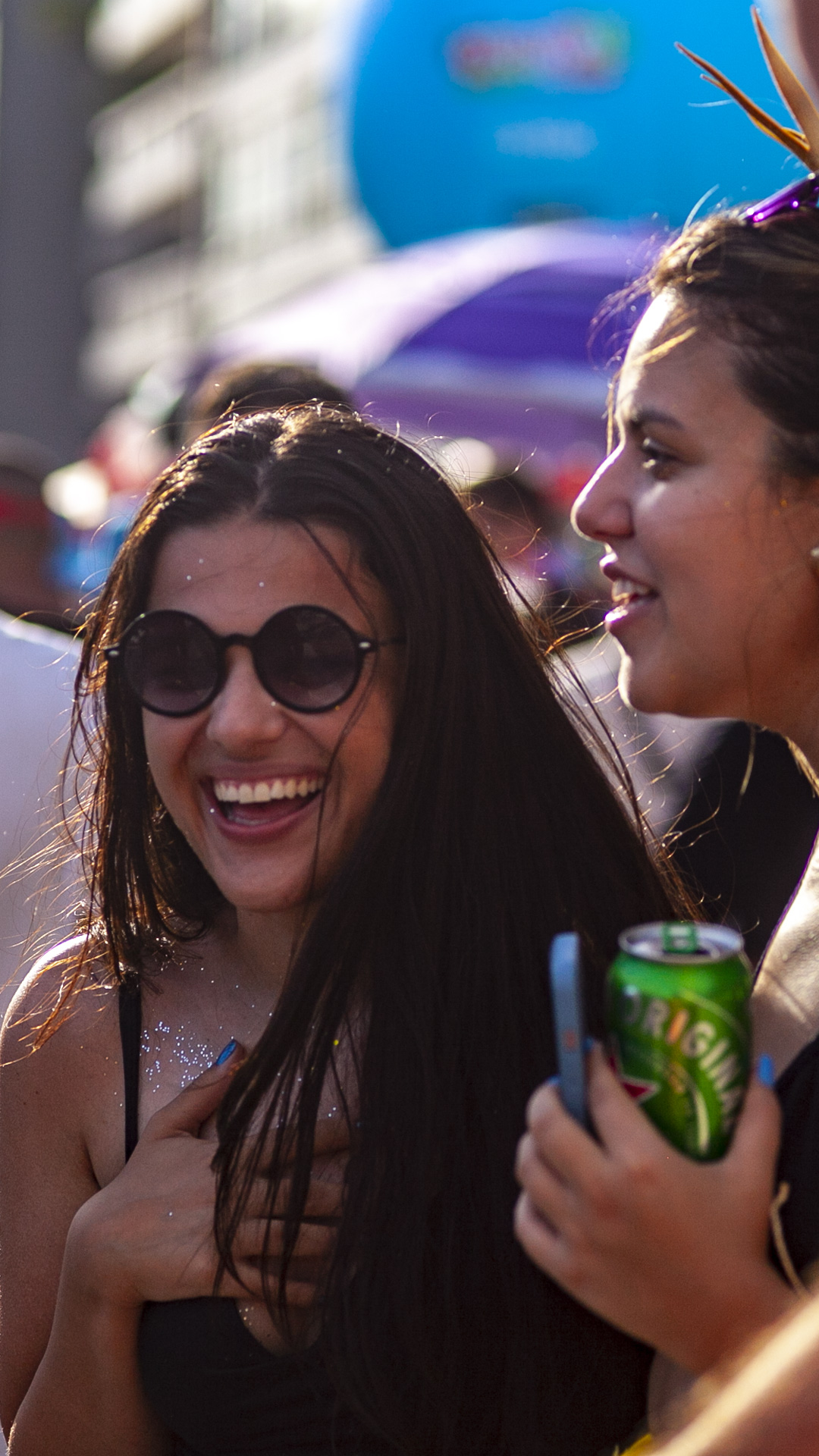 Friends share laughter and joy, embodying the true spirit of Carnival with every smile and dance move.